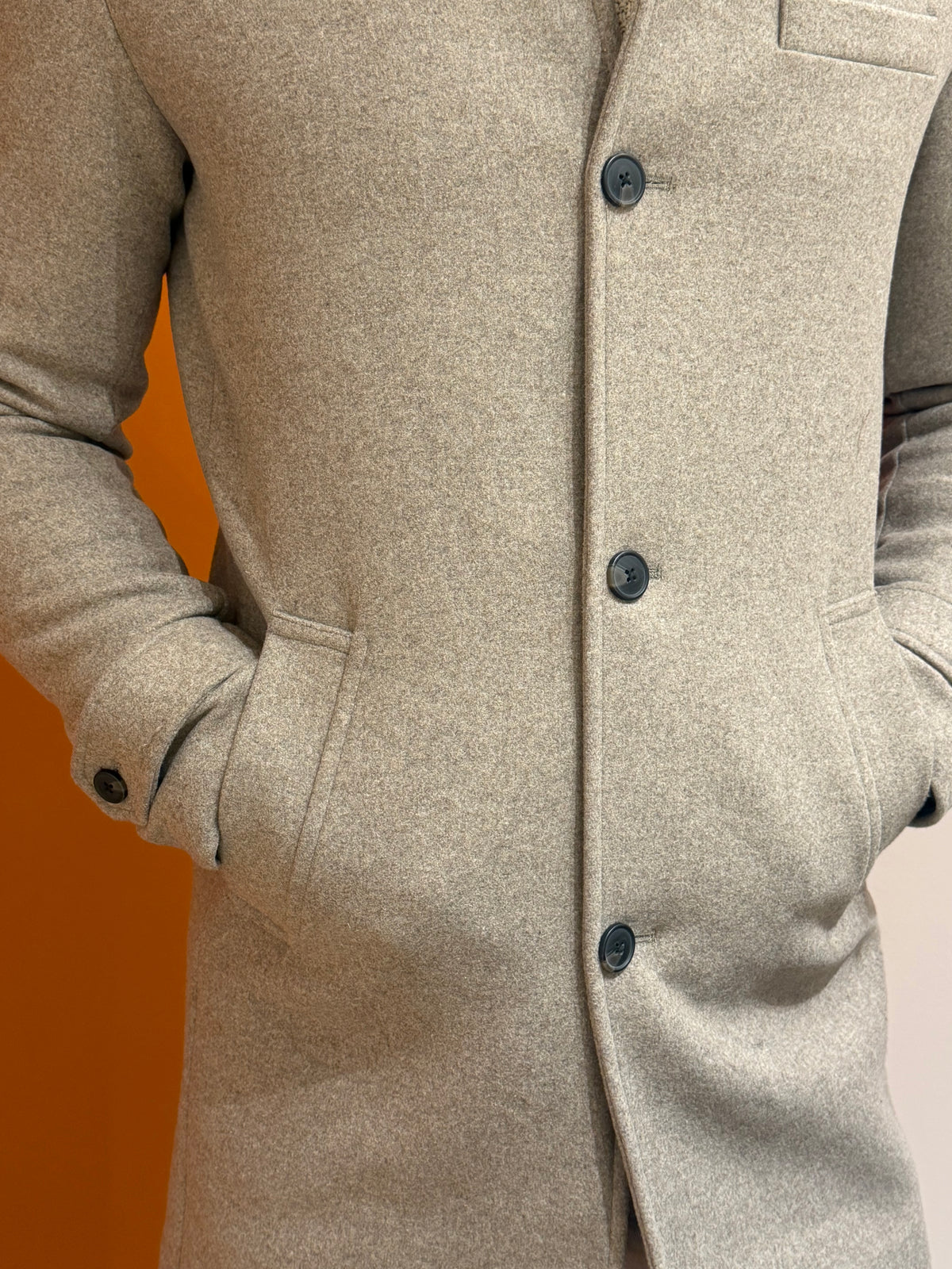 Cappotto monopetto grigio melange con inserto imbottito