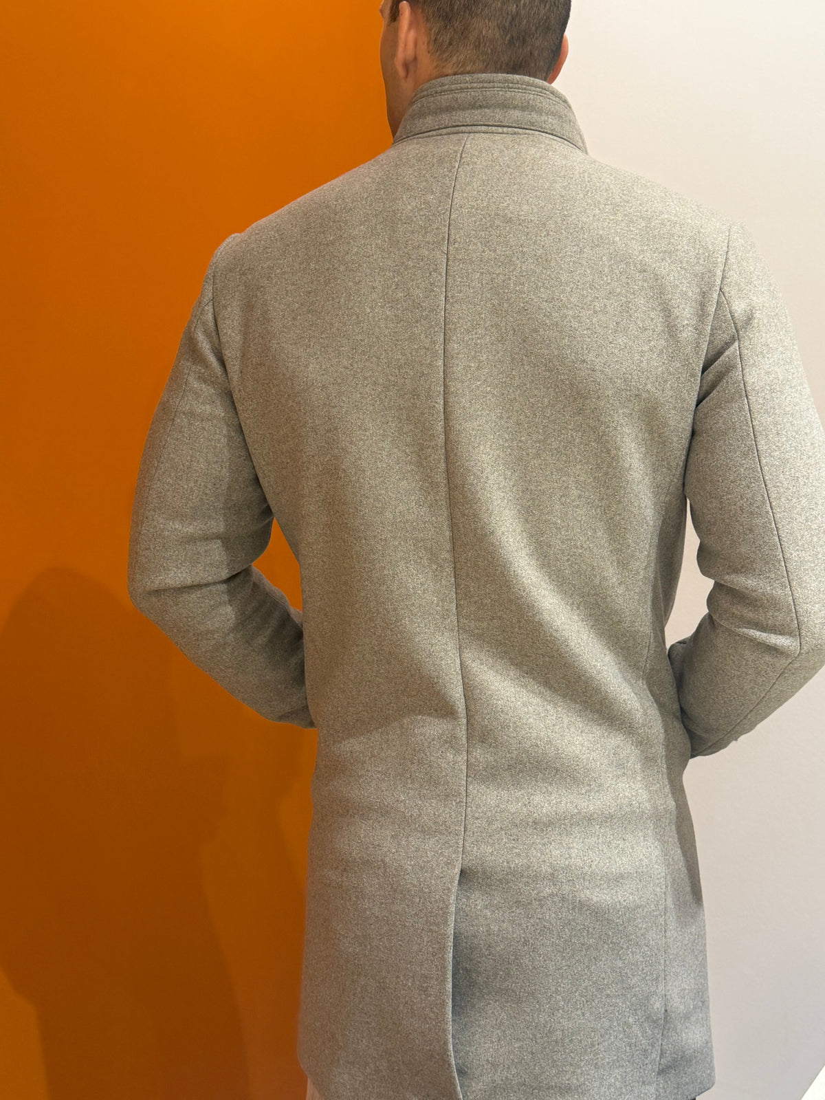 Cappotto monopetto grigio melange con inserto imbottito