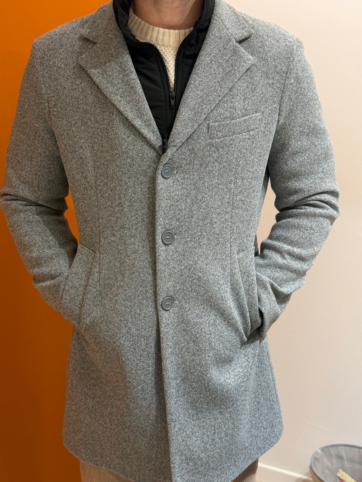 Cappotto monopetto grigio melange con pettorina a zip