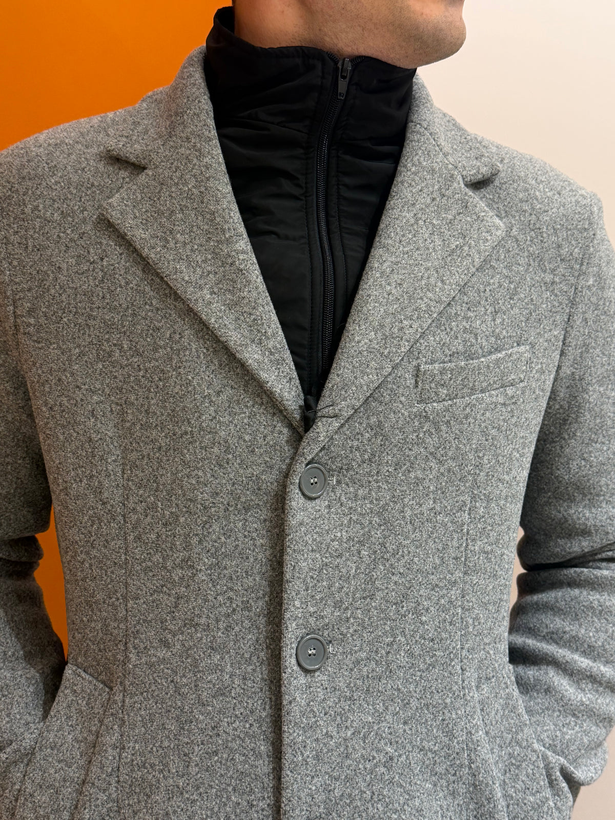 Cappotto monopetto grigio melange con pettorina a zip